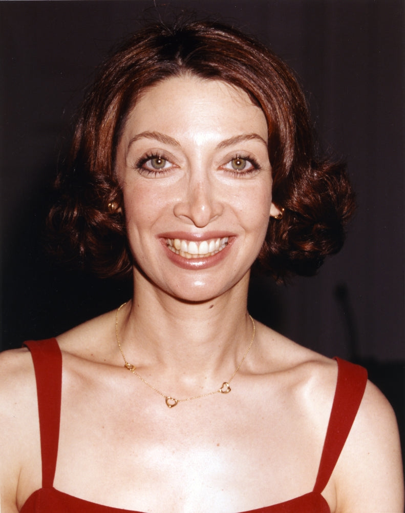 Illeana Douglas photo print in a red dress with necklace