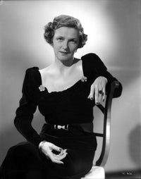 Irene Castle seated on chair in black dress photo print