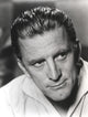 Close-up portrait photo print of Kirk Douglas in a white polo shirt.