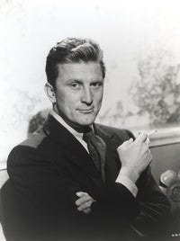 Kirk Douglas portrait photo print in black suit with cigarette.