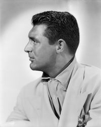 Cary Grant side portrait photo print in a stylish jacket and shirt.