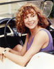 Polly Draper smiling in a purple tank top photo print