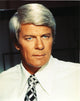 Peter Graves portrait photo print in white sleeves.
