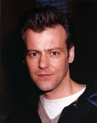 Rupert Graves Slightly Smiling Photo Print showcasing the actor's charming expression.