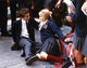 Hilary Duff sitting on floor in army uniform photo print