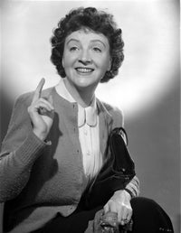 Patricia Collinge seated in sweater photo print showcasing vintage charm.