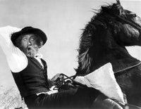 Gene Wilder riding a horse film still photo print.