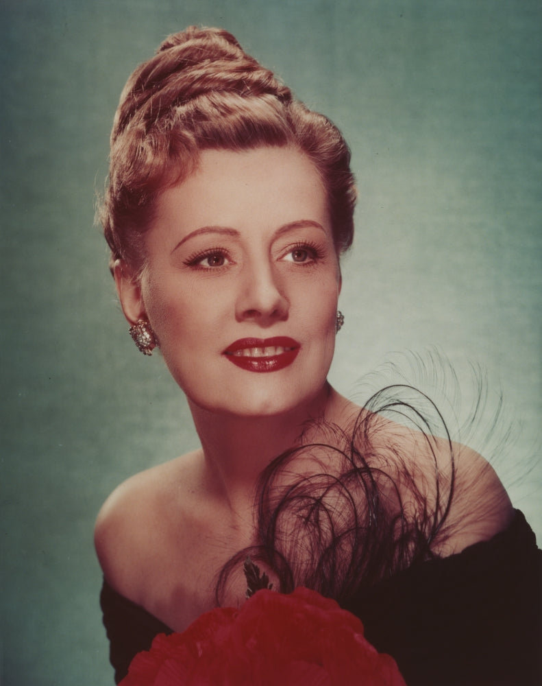 Irene Dunne wearing a black dress on a blue background photo print