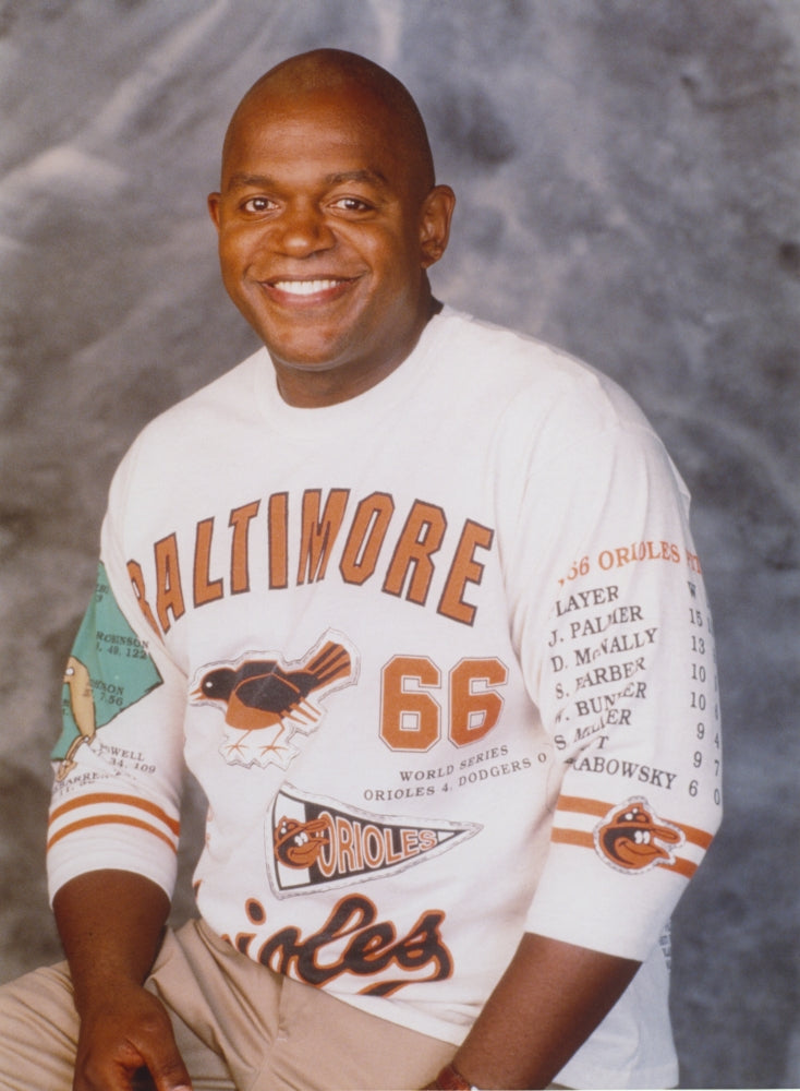 Portrait photo print of Charles Dutton smiling in a white shirt