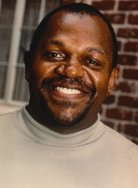 Close-up portrait photo print of Charles Dutton smiling, available in multiple sizes.