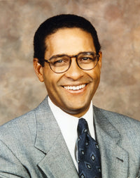 Bryant Gumbel portrait photo print in grey coat