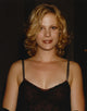 Alison Eastwood smiling portrait photo print on a black background.