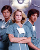 Shelley Hack posed in green scrub suit with mask photo print.