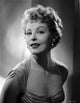 Portrait of Arlene Dahl in a side view pose photo print.
