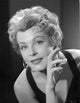 Arlene Dahl portrait photo print featuring black dress and hook earrings.
