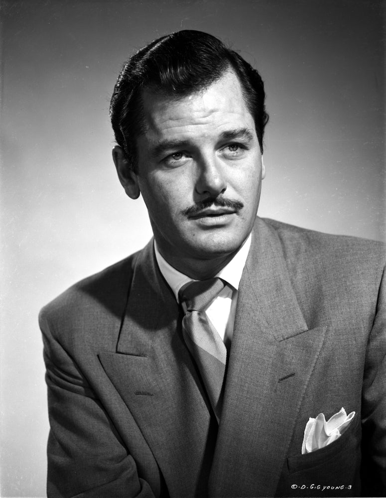 A Portrait Of Gig Young Photo Print showcasing the iconic actor.