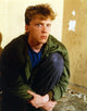Anthony Hall sitting in a green jacket photo print