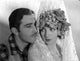 Bebe Daniels close up portrait photo print with partner in white linen shawl and flowers.