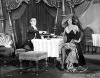 Bebe Daniels in a black strap dress at dinner photo print