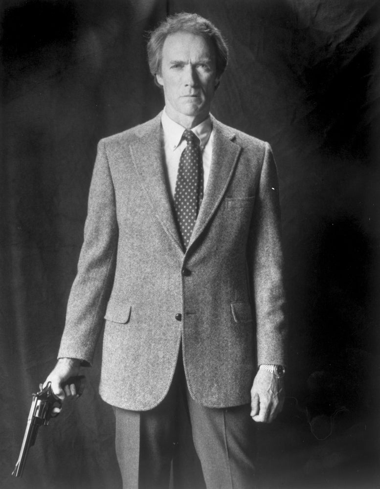 Clint Eastwood in tuxedo photo print against black background