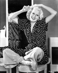 Jean Harlow seated in a black polka dot dress photo print