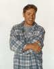 Ron Eldard smiling portrait photo print on white background.