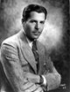 Warner Baxter posed in suit photo print