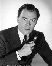 John Beal posed in black holding fork photo print