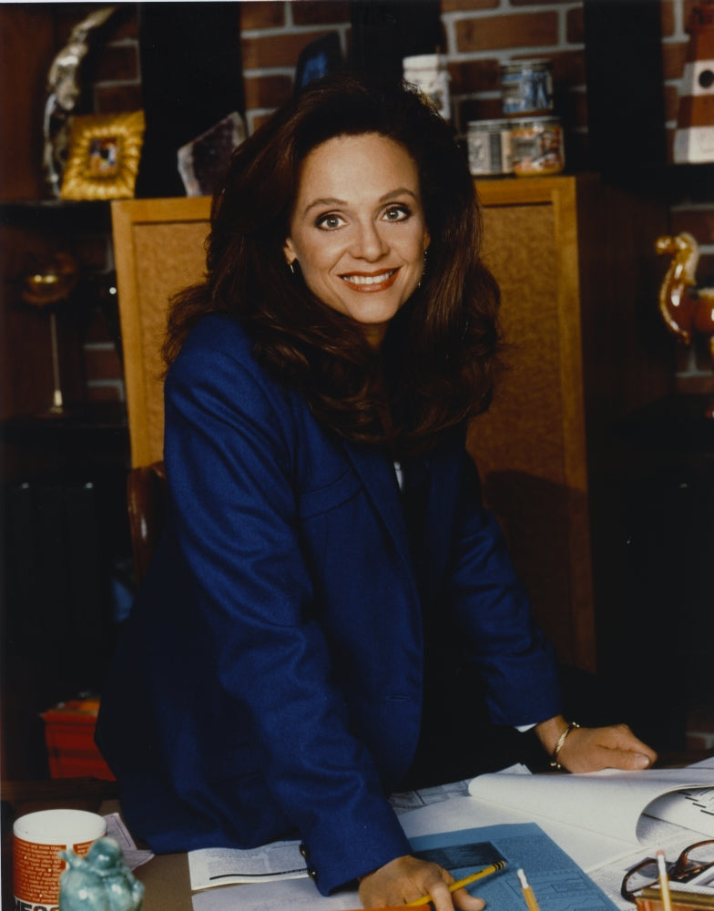 Valerie Harper posed elegantly in a blue suit photo print.