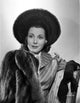 Frances Dee smiling in a fur coat black and white photo print