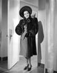 Frances Dee black and white photo print in stylish black coat