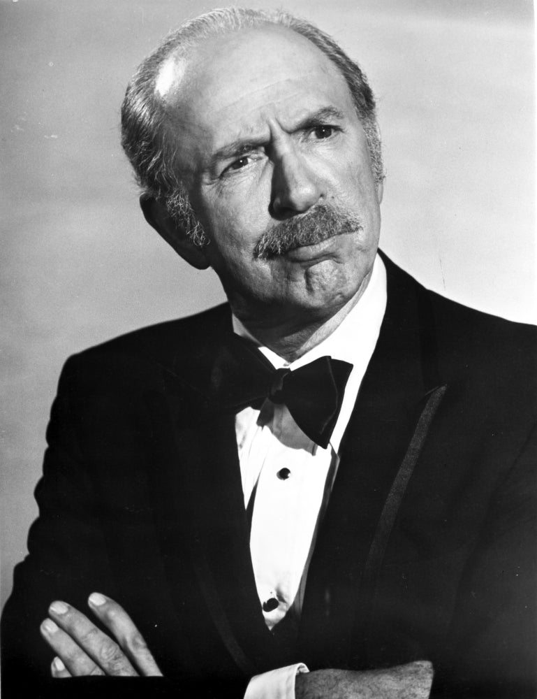 Jack Albertson posed in black suit photo print