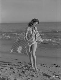 Susan Hayward posed in a colorful swimming suit photo print