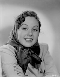 Susan Hayward wearing a long sleeve blouse with scarf photo print