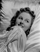 Susan Hayward Lying on a Silk Cloth in Dress Photo Print