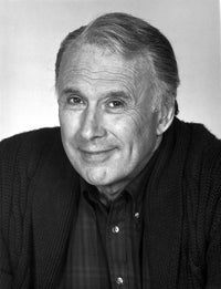 Richard Kiley posed in black suit with white background photo print.