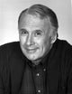 Richard Kiley posed in black suit with white background photo print.