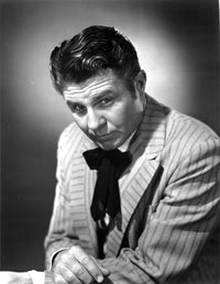 Jim Davis Posed in Stripe Suit Photo Print showcasing cartoonist charm.