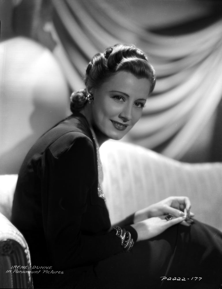 Irene Dunne elegant portrait photo print in a sitting pose.