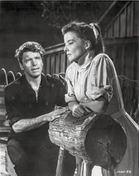 Rainmaker Woman Feeling Broke Photo Print featuring a woman in a white dress and a man in a black suit.