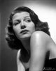 Rita Hayworth posing in a black dress photo print