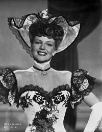 Rita Hayworth photo print in a colorful gown, vintage Hollywood glamour.