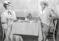 Gigi Couple Having Conversation at Dining Table Photo Print