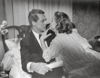 Indiscreet Man and Lady on Bed Photo Print
