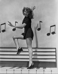 Rita Hayworth photo print featuring musical notes background.