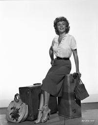 Rita Hayworth sitting pose photo print, classic Hollywood art.