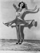 Rita Hayworth Posed with a Big Smile Photo Print