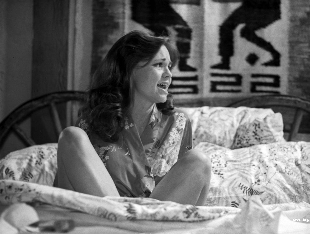 Sally Field sitting on a bed photo print capturing a classic cinematic moment.