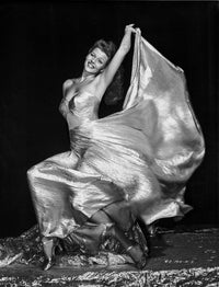Rita Hayworth posed elegantly in a long gown photo print.