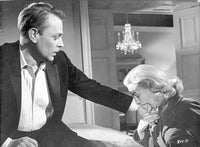 Home Before Dark photo print featuring a lady and man talking.